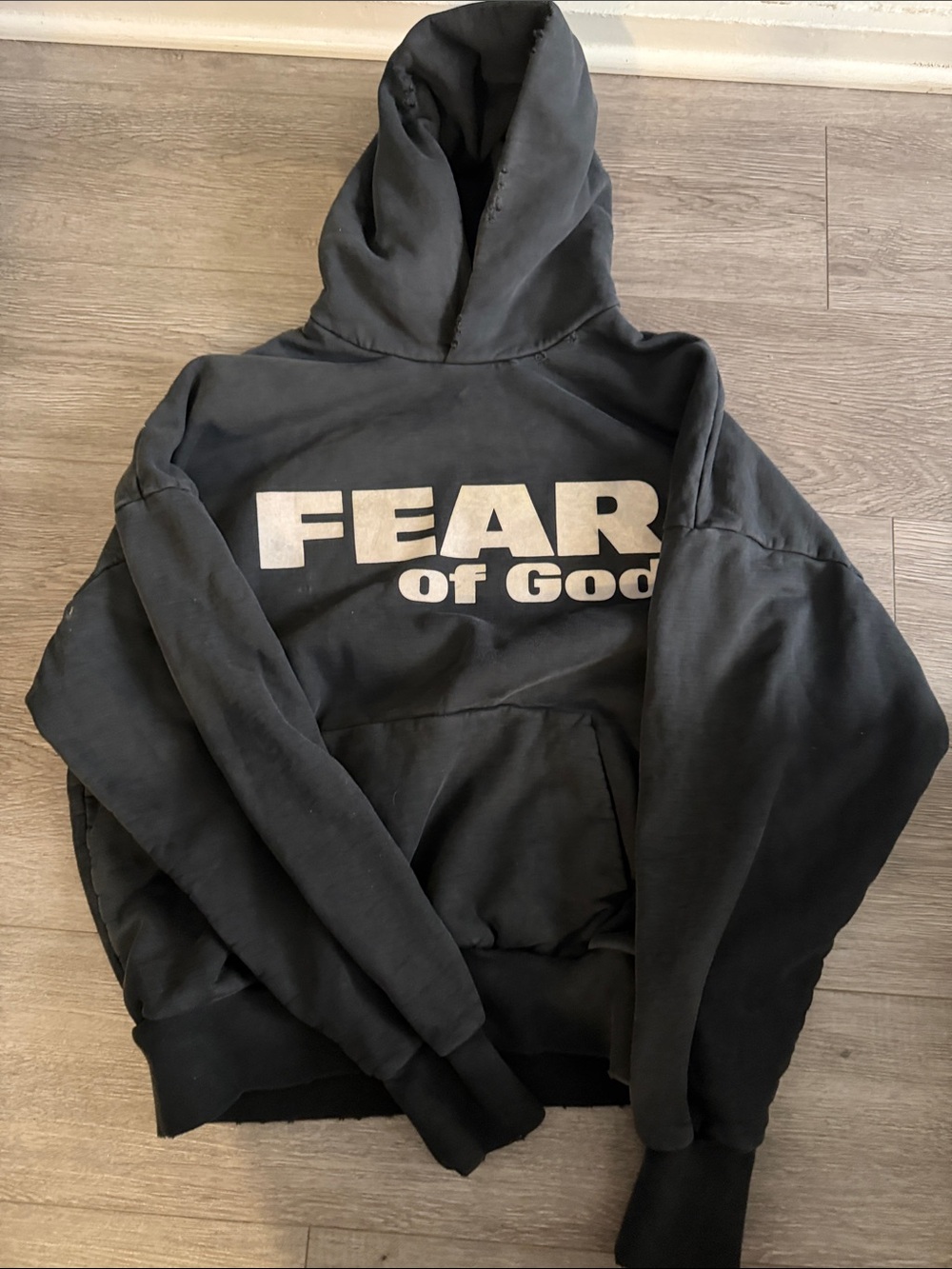 Fear of God Black Hoodie with White Logo